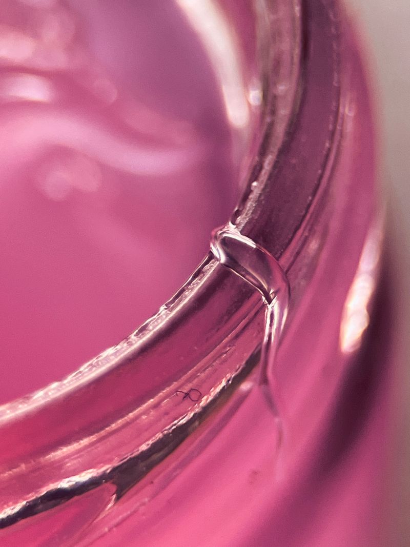 pink cosmetic texture swirled in a glass dish