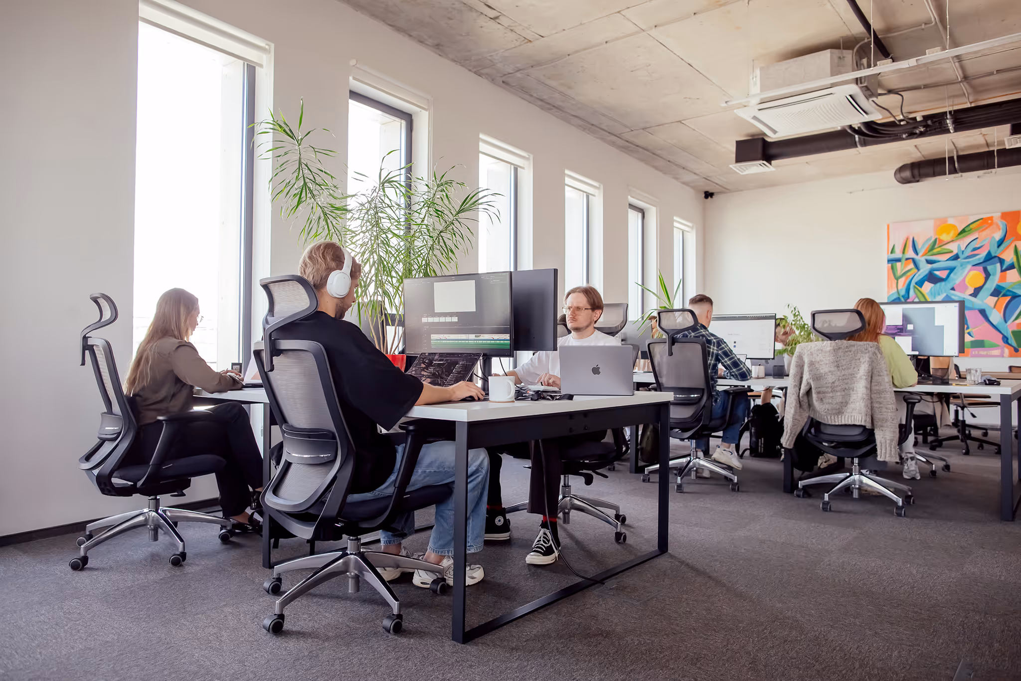 Team members working in Excited office