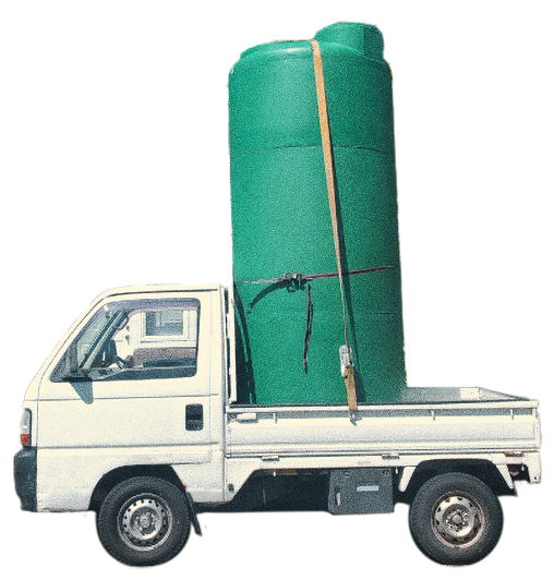 White kei truck holding a large green rain barrel