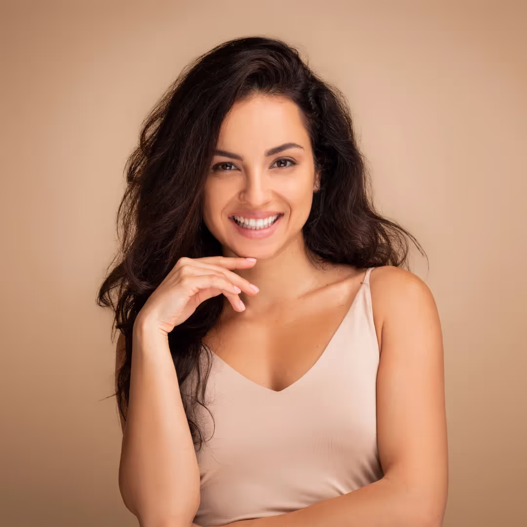 The happy reaction of a girl after seeing a glow from Hydrafacial