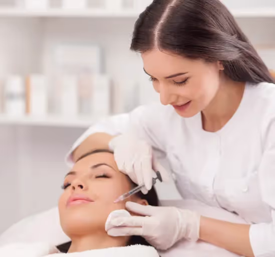 Expert dermatologist doing GFC plasma restoration on chicks