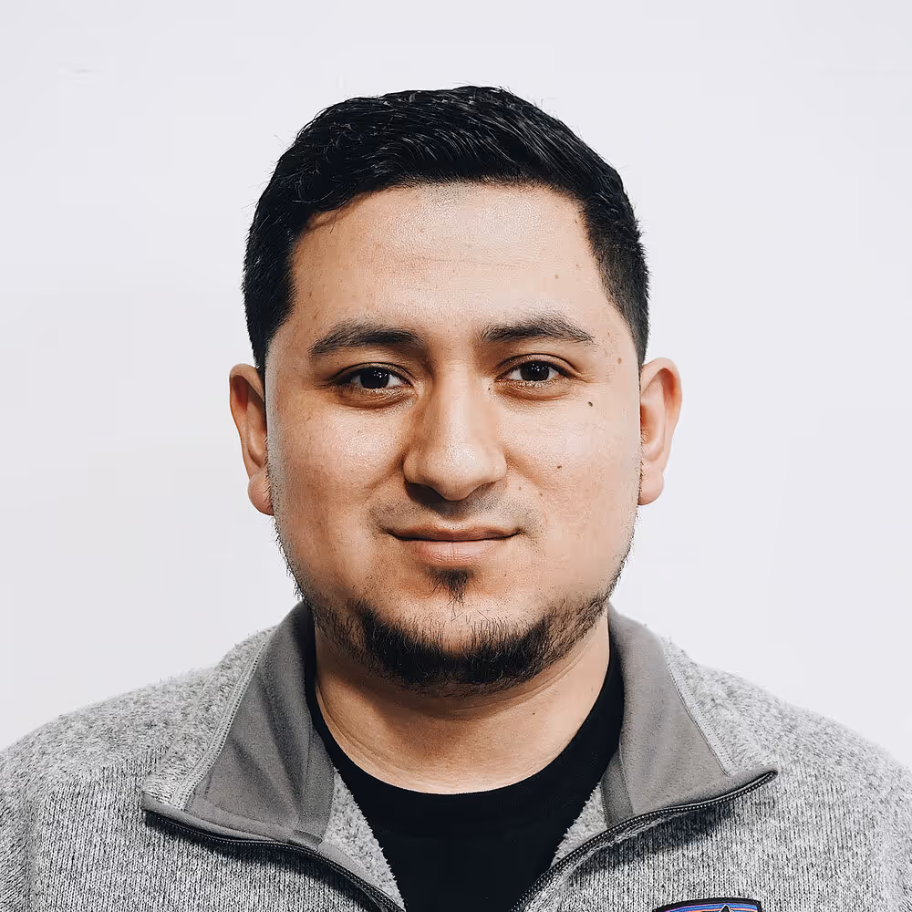 Headshot of Alex, An Apparel Graphics Client Success Coordinator 