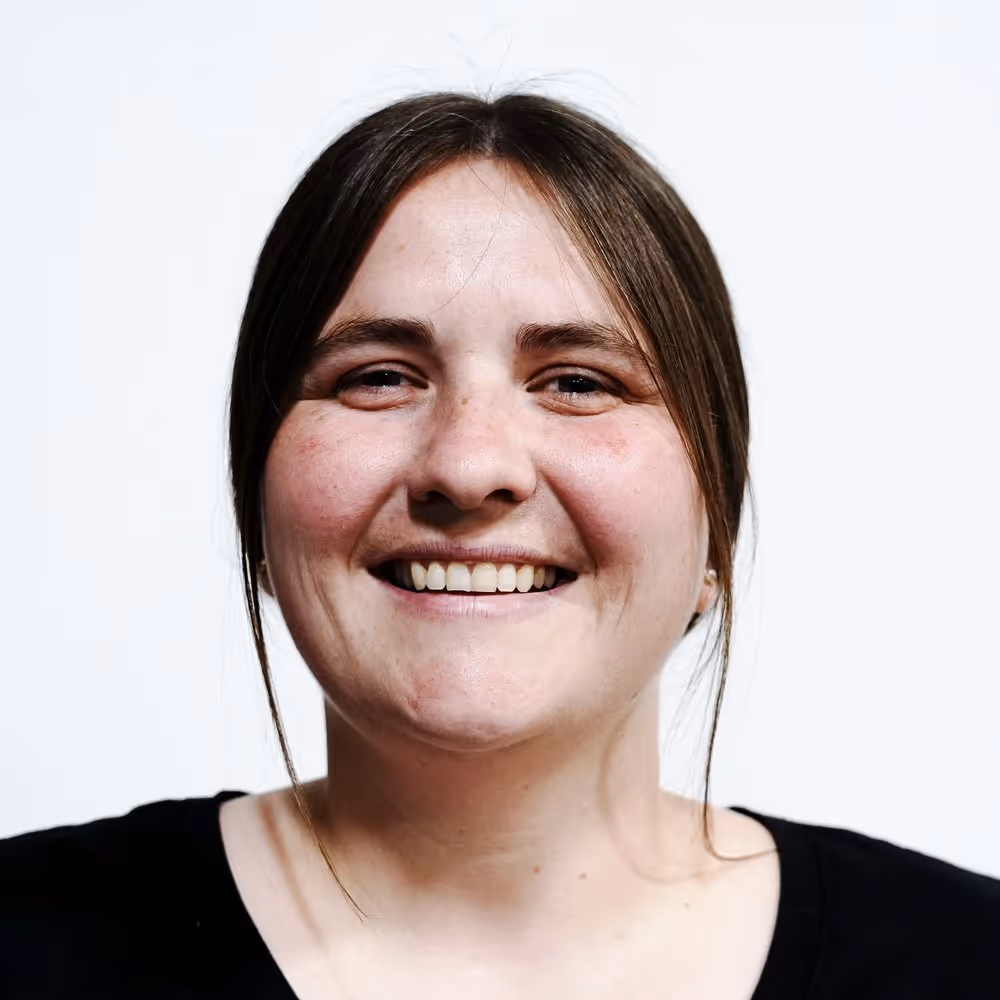 Headshot of Rebecca, Apparel Graphics Logistics Coordinator
