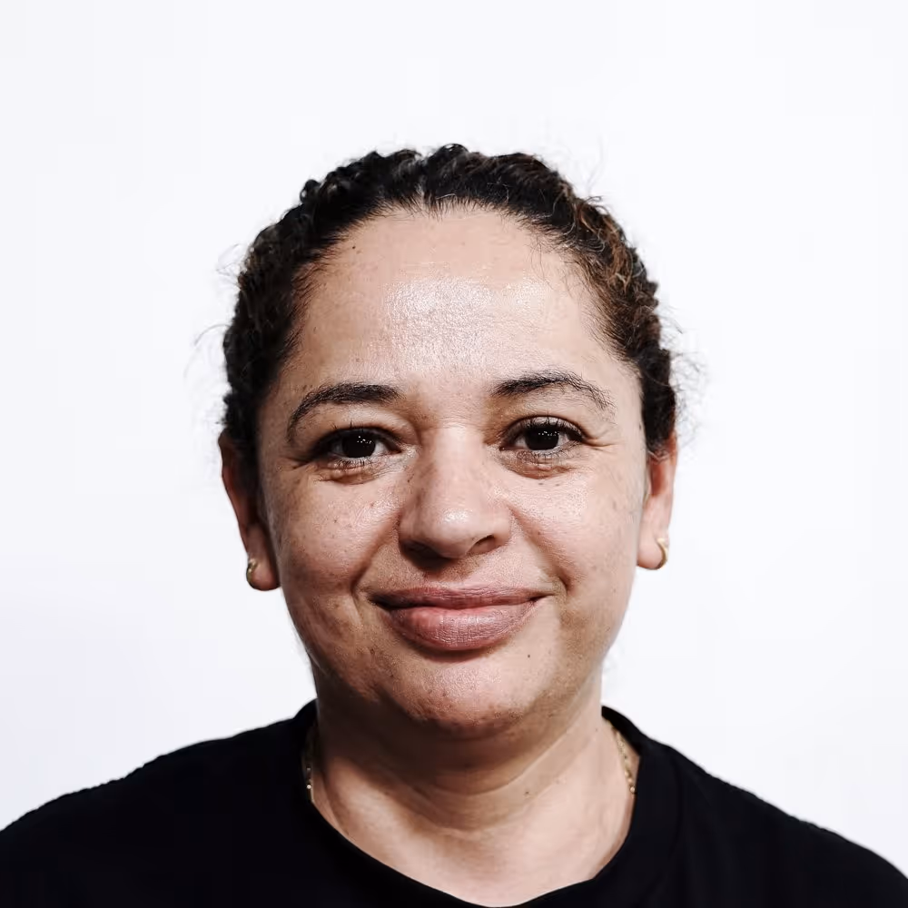 Headshot of Olga, An Apparel Graphics Sewing Machine Operator