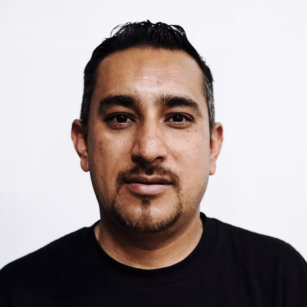 Headshot of Miguel, An Apparel Graphics Production Specialist
