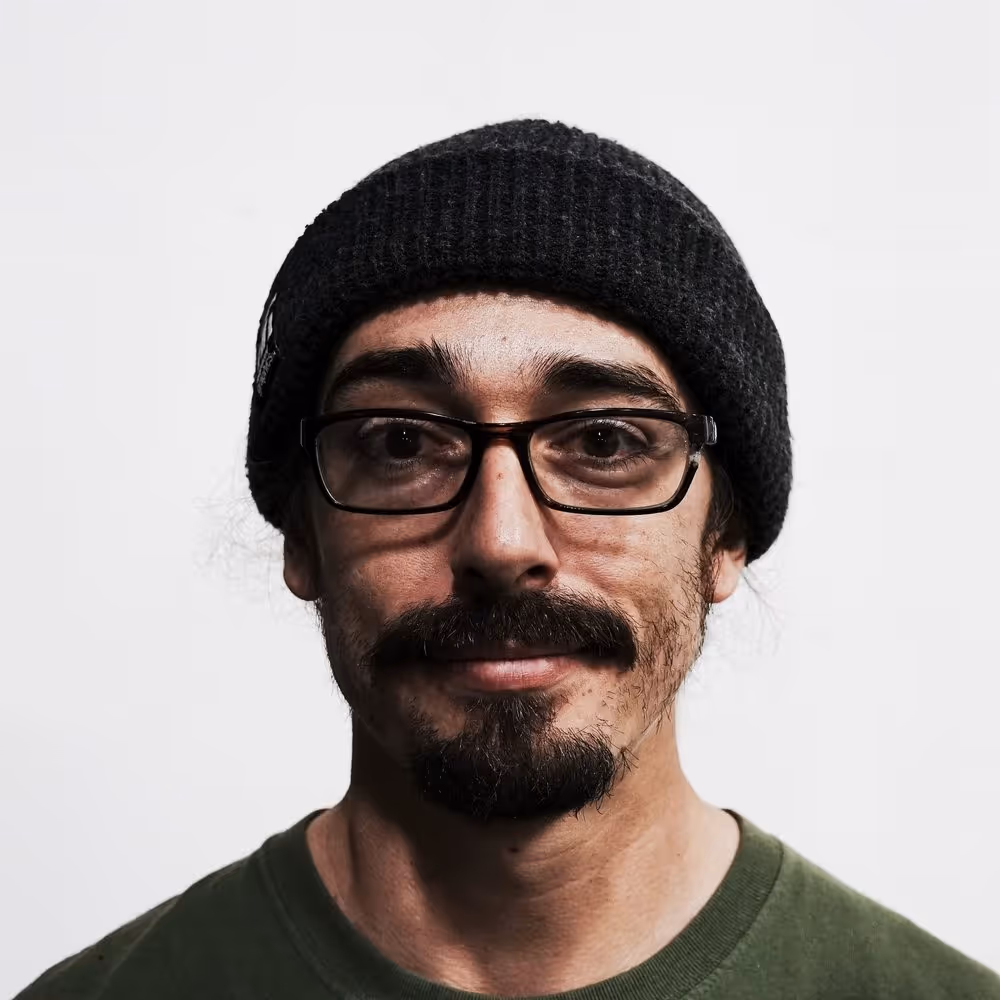 Headshot of Adam, An Apparel Graphics Press Operator
