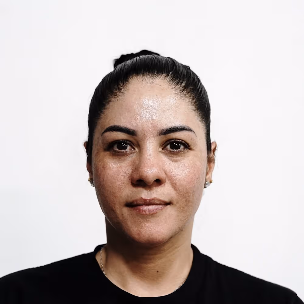 Headshot of Iris, An Apparel Graphics Production Specialist