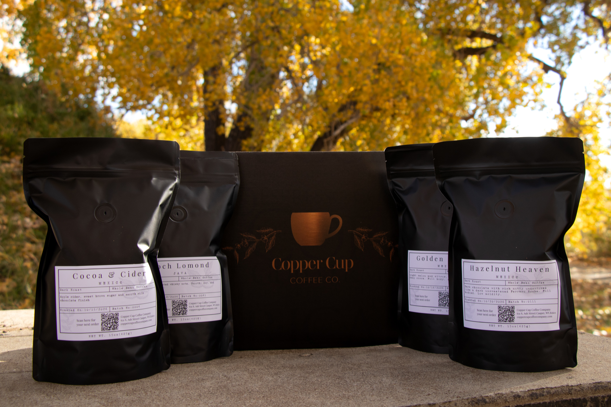A selection of locally roasted Copper Cup coffees and branded sampler box