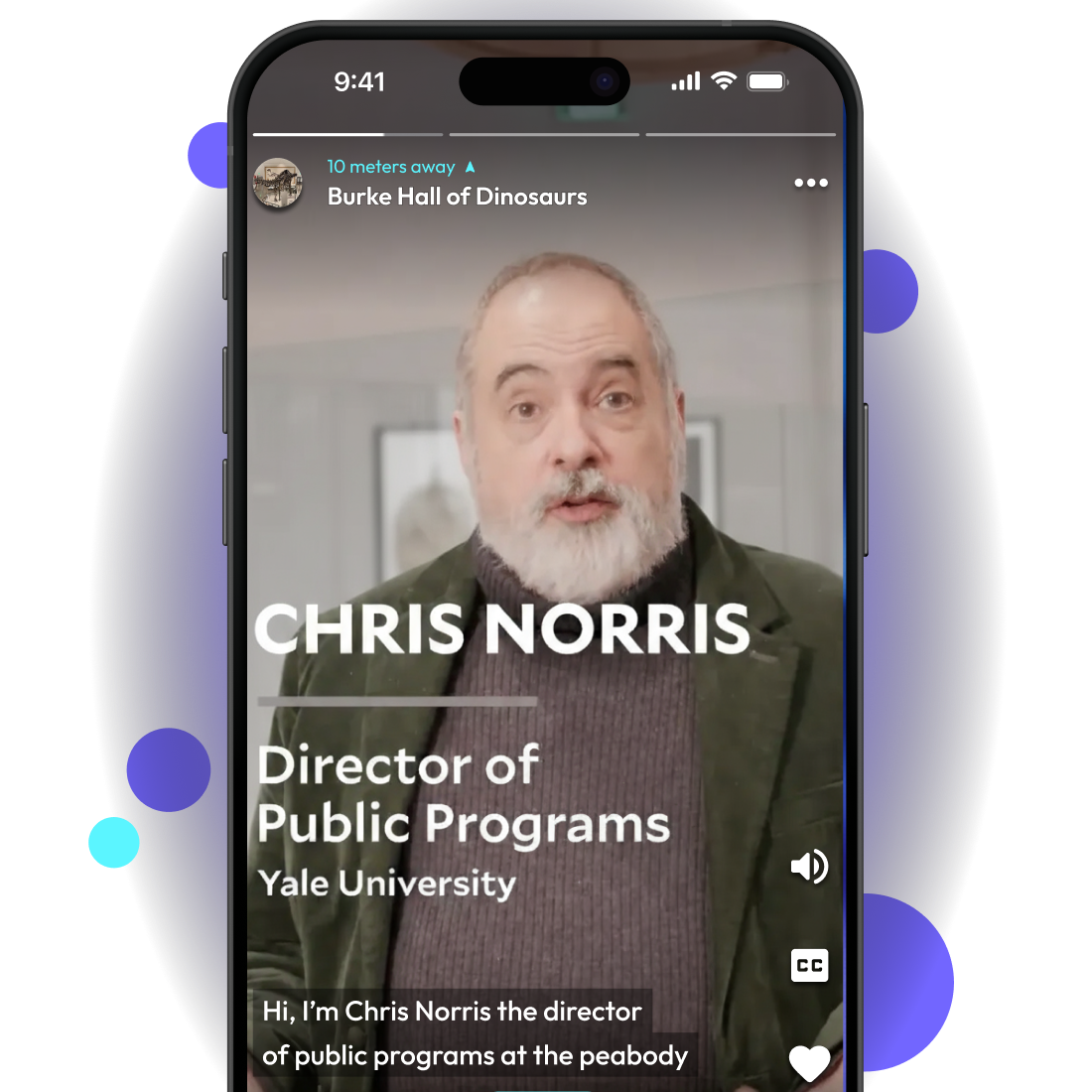 Video screenshot of Chris Norris, Director of Public Programs at Yale University, speaking in the Burke Hall of Dinosaurs.