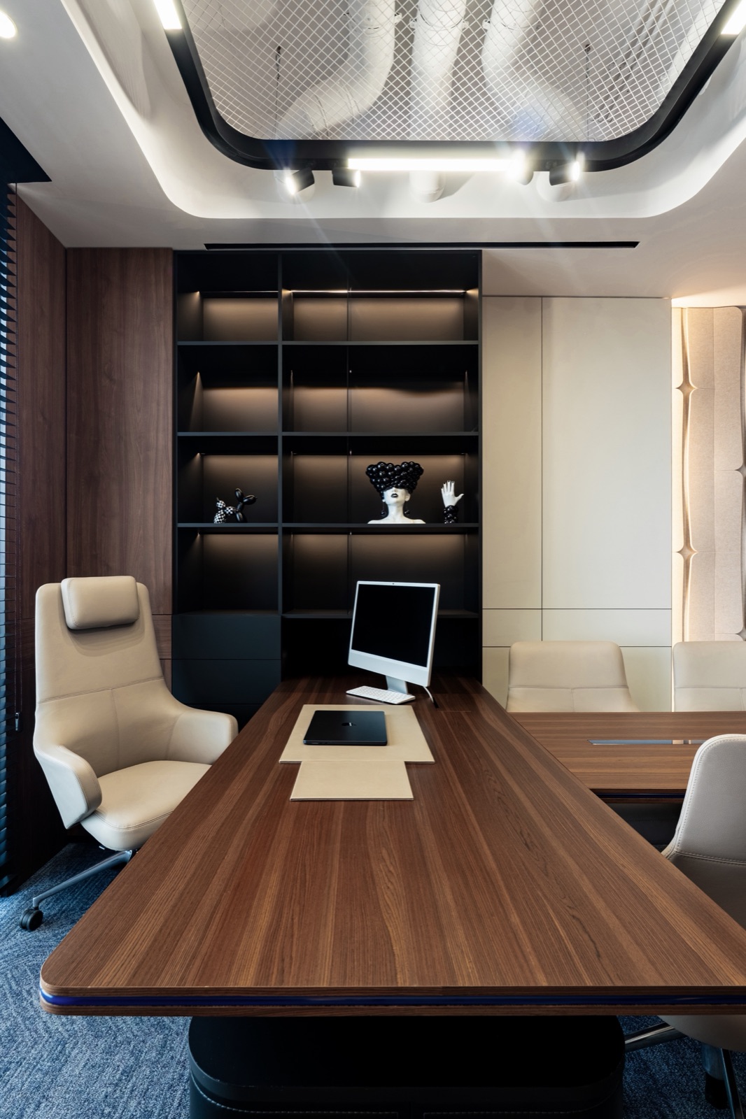 executive desk and bookshelves