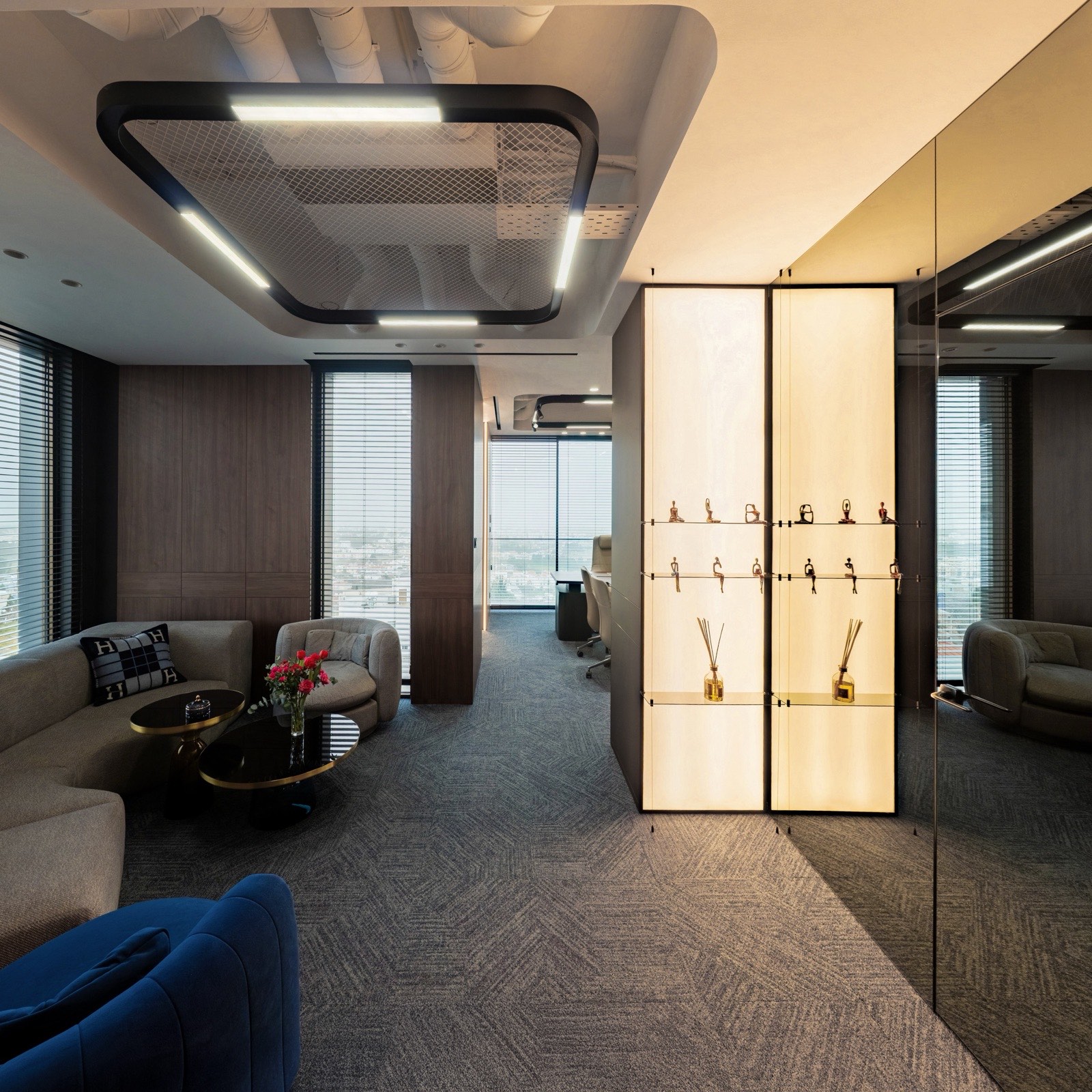 CEO Office interior by COBALT, Paphos, Cyprus - lounge and backlit column shelf