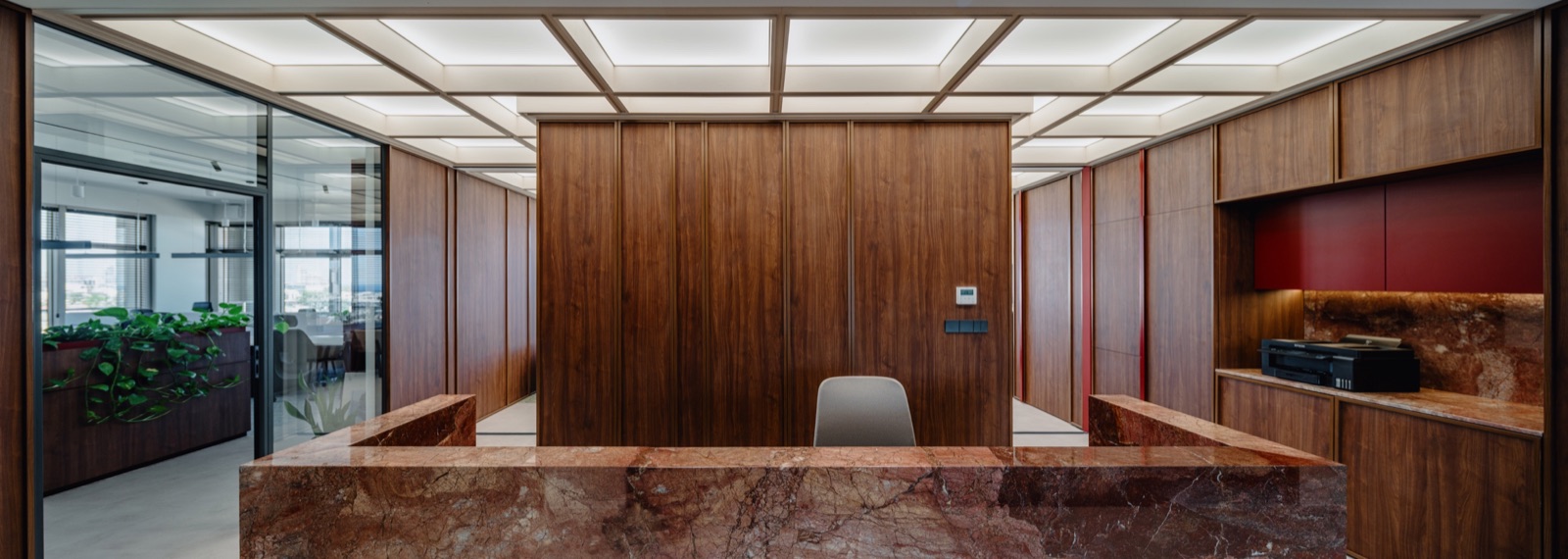 reception and walnut wall, panoramic view