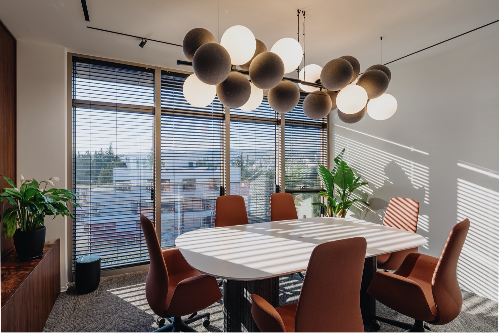 meeting room with pendant light cluster