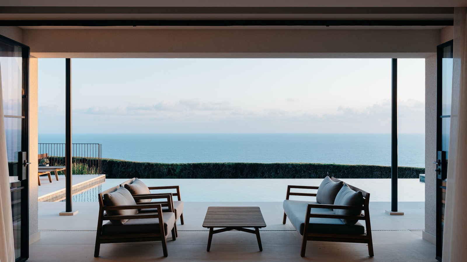 living room opening onto the terrace and sea view