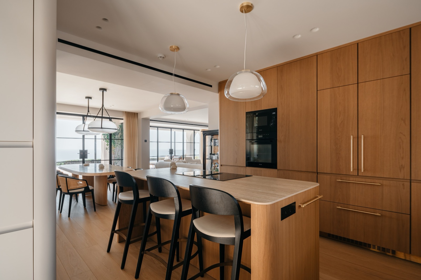 kitchen with island and bar stools