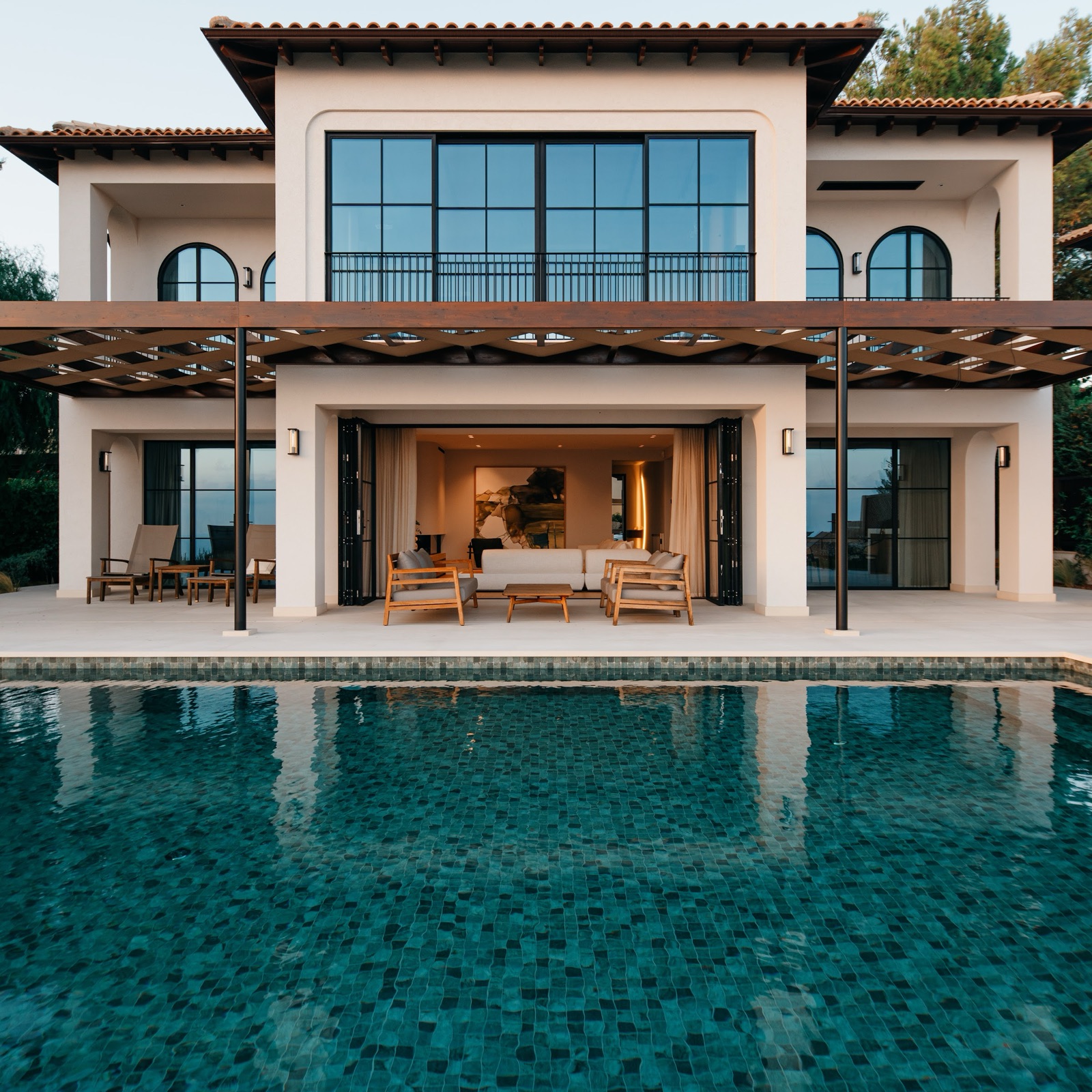Aphrodite House by COBALT, Aphrodite Hills, Cyprus - terrace and pool with the glass doors open