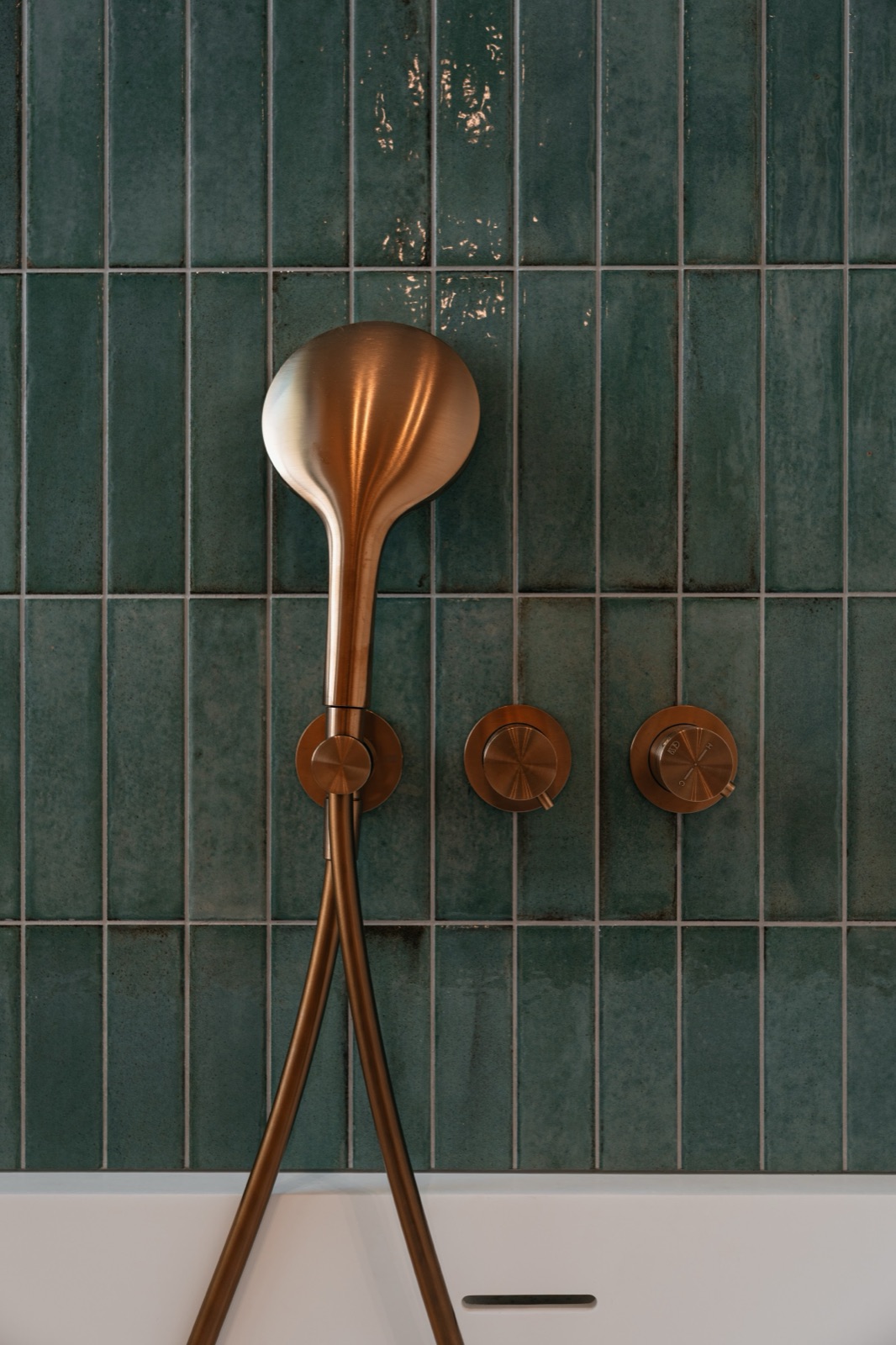 Aphrodite House by COBALT, Aphrodite Hills, Cyprus - copper fittings on green tiles
