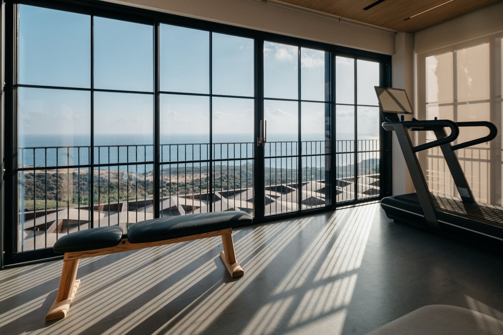 Aphrodite House by COBALT, Aphrodite Hills, Cyprus - home gym with sea view