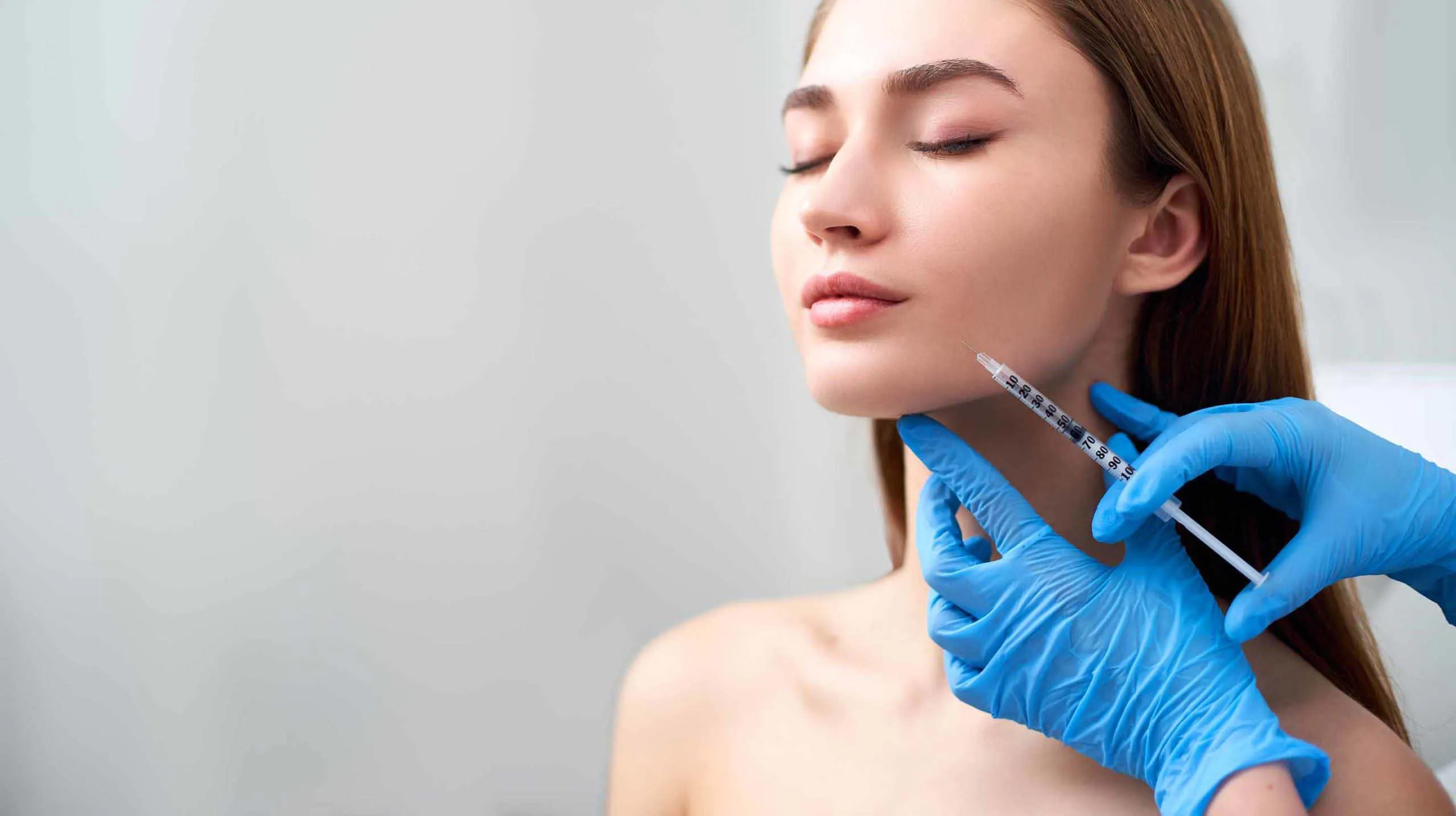 Satisfied Patient getting cosmetic treatment by Dermatology Associates Medical Group