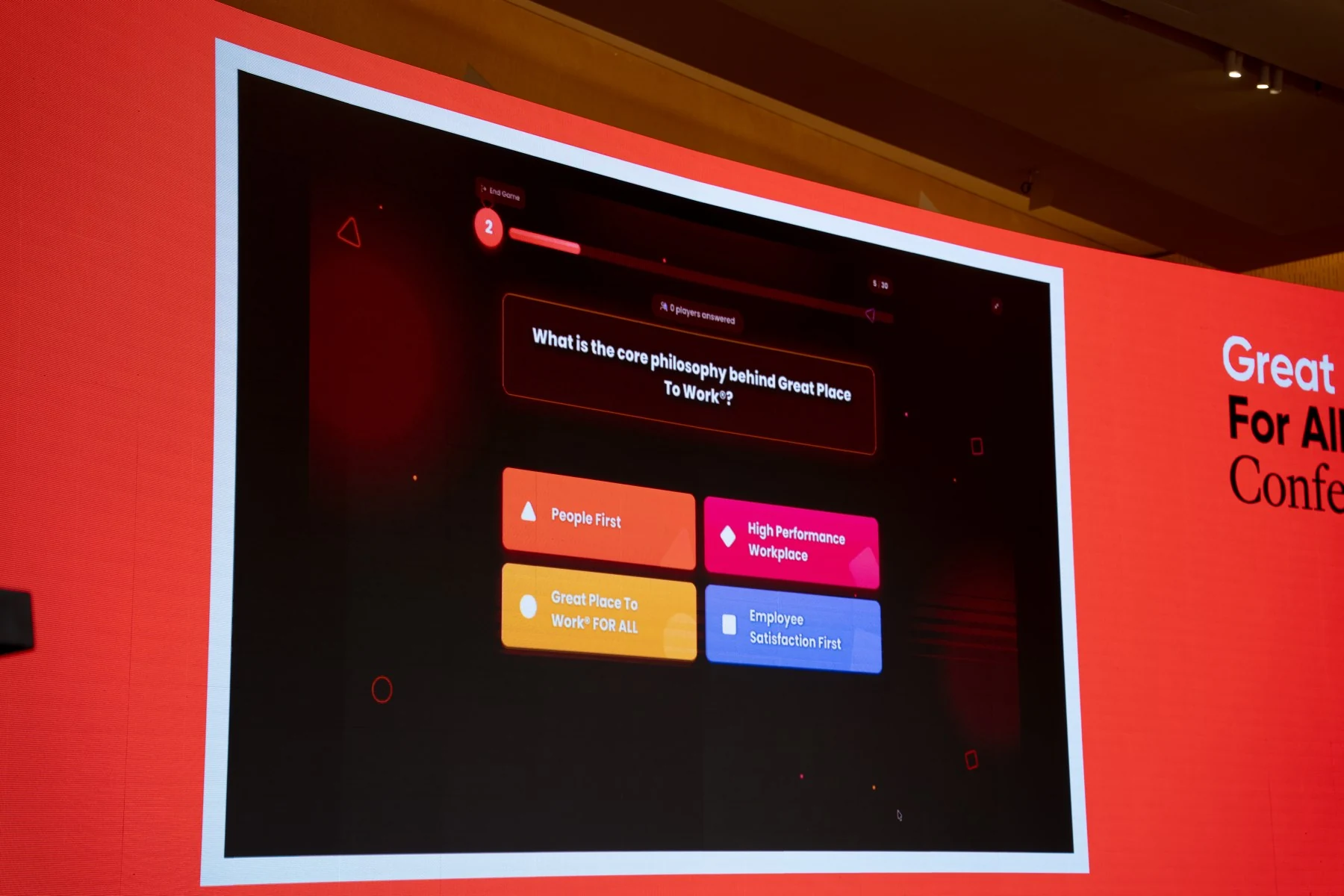 Live conference quiz question displayed on the branded screen