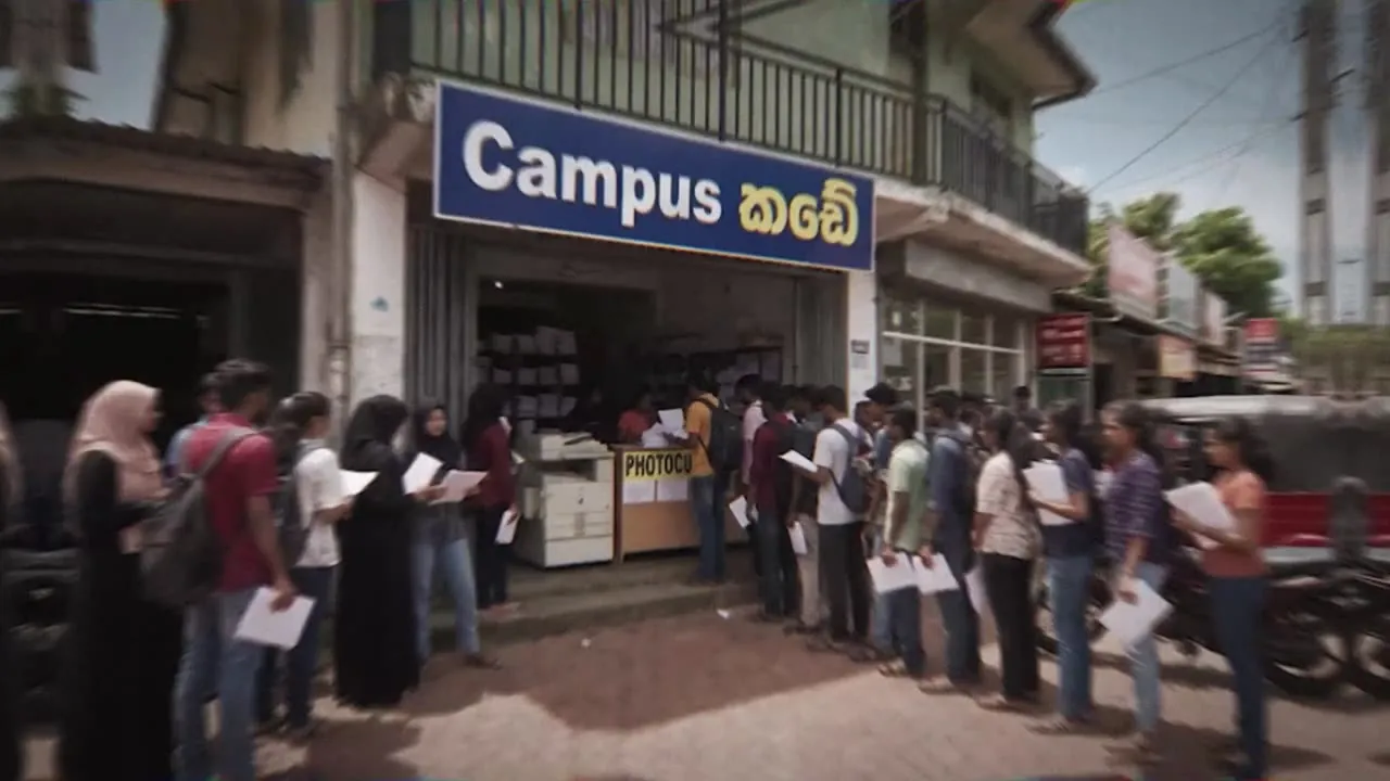 Students crowding a photocopy shop for tuition notes.