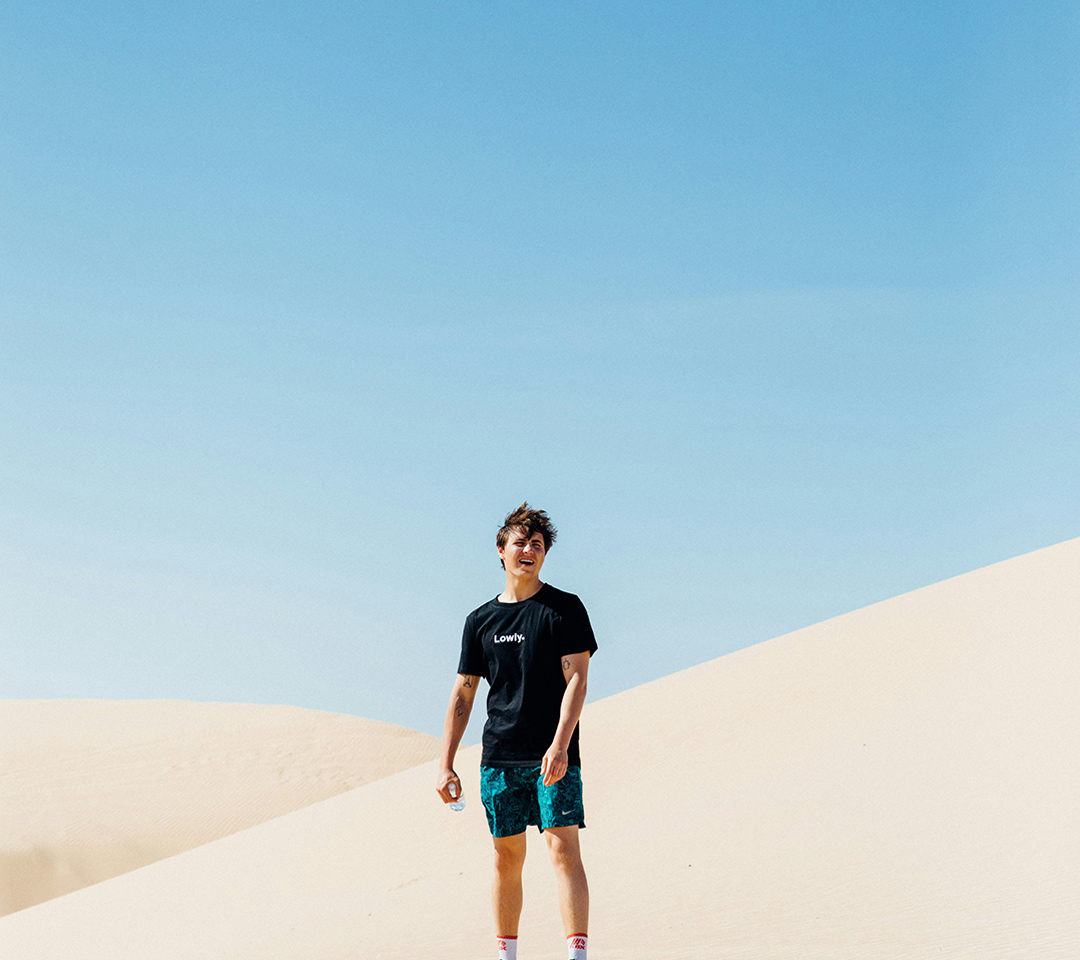 blue skies and guy standing
