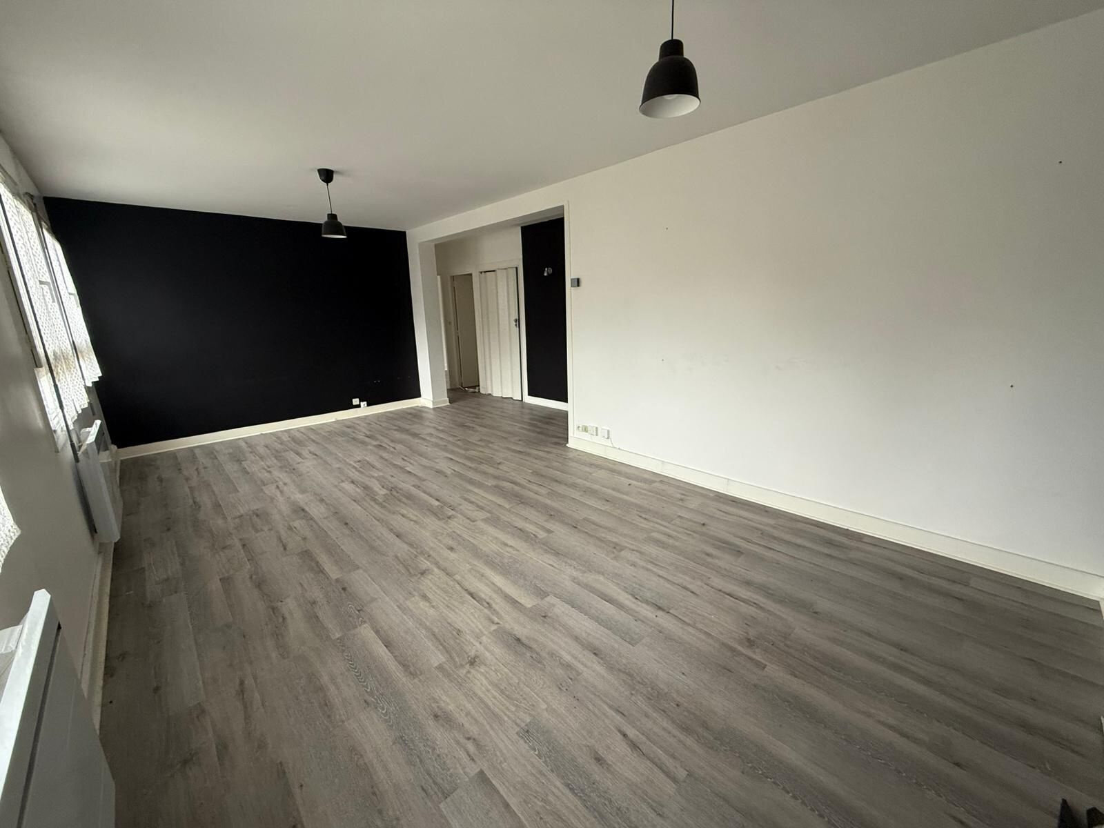 Appartement traversant à proximité de la gare de Sartrouvill