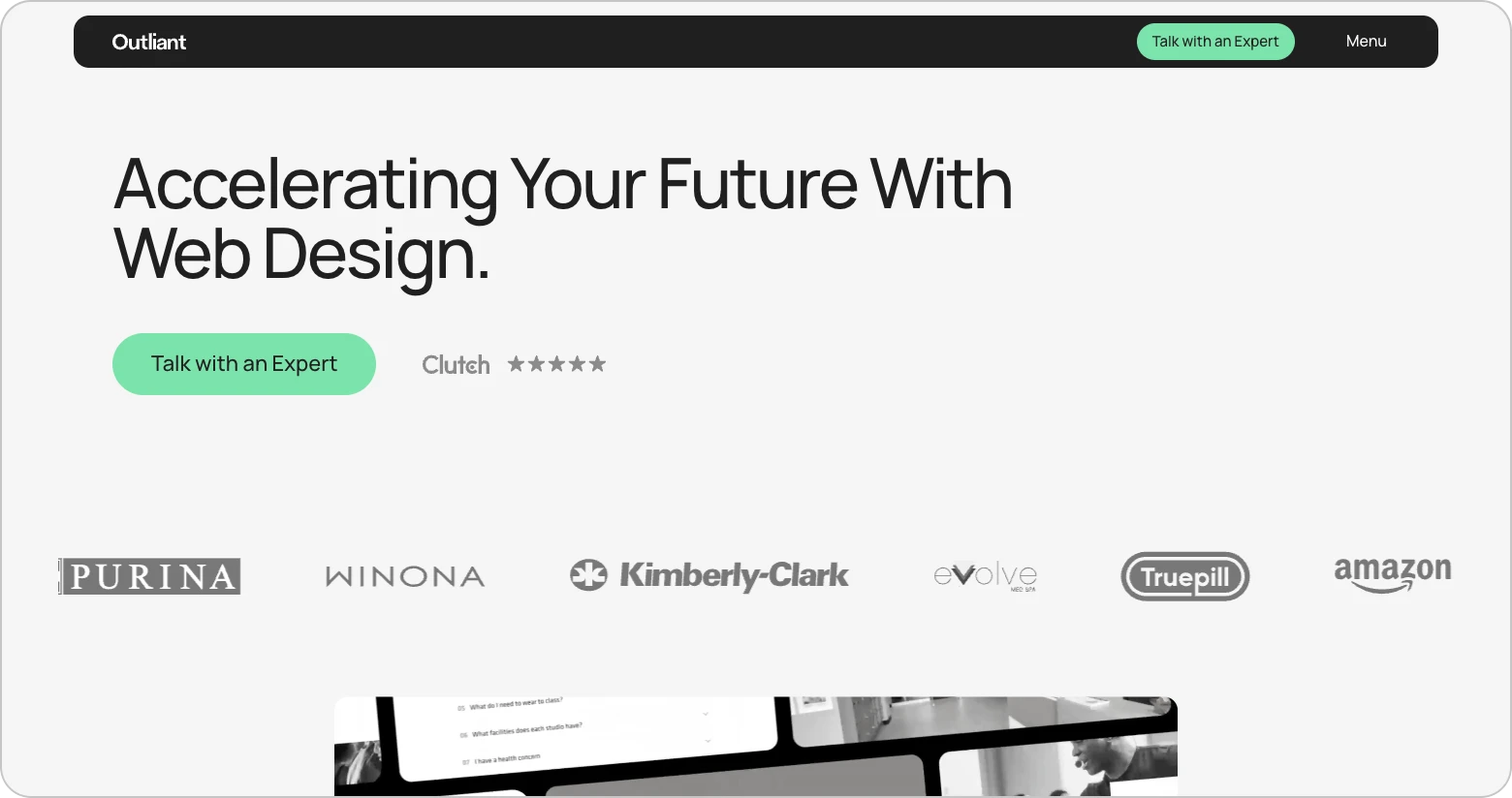 Outliant homepage reading "Accelerating Your Future With Web Design" above Purina, Kimberly-Clark and Amazon logos