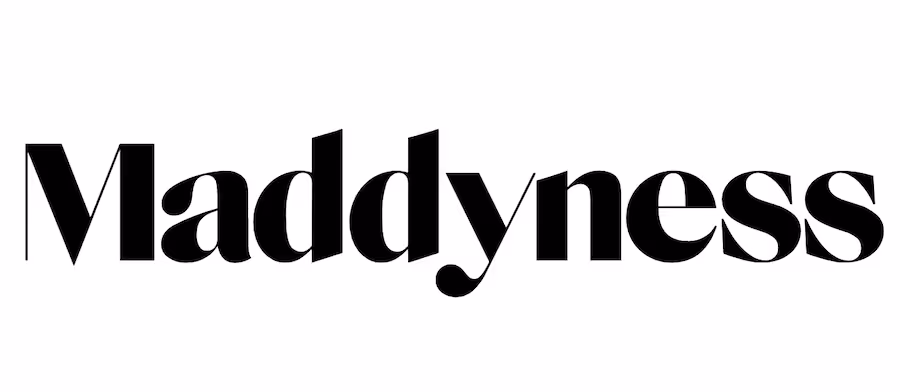 Logo du mot Madyness en lettres noires stylisées.