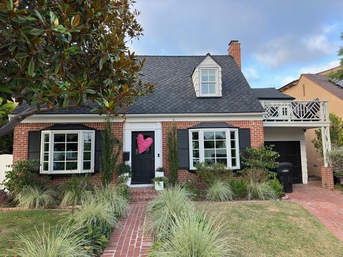 residential asphalt shingle roof replacement on brick home