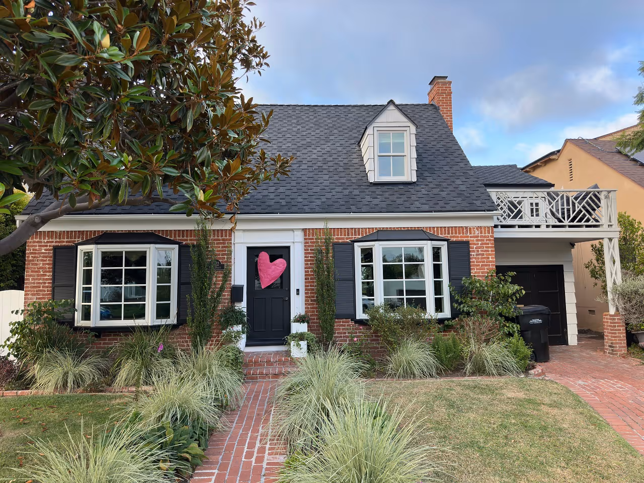 residential asphalt shingle roof replacement on brick home