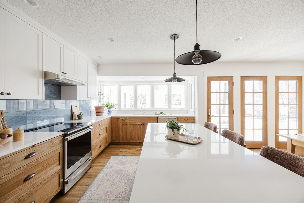 Kitchen addition and remodel. New Plumbing, electrical, new kitchen layout with quartz countertops, hardwoods floors, and appliances 
