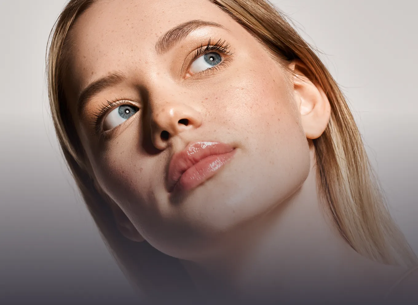 A close up of a woman's face.