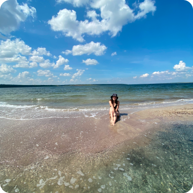 I'm sitting on a spit of estuary that is not far from my hometown