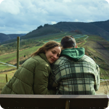 My man and I posing in front of the mountains