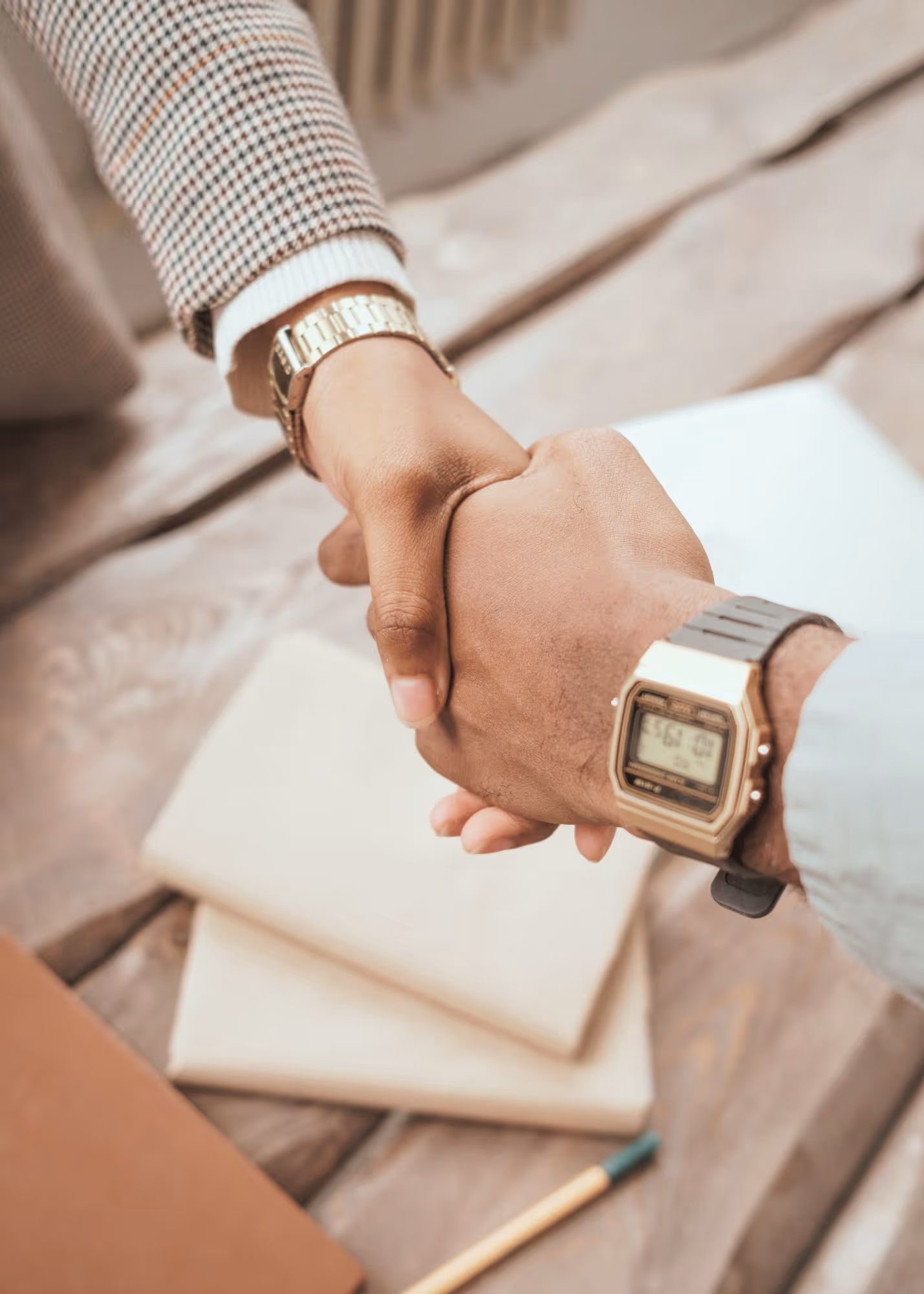 Handshake symbolizing trusted property management partnerships in Madison, WI