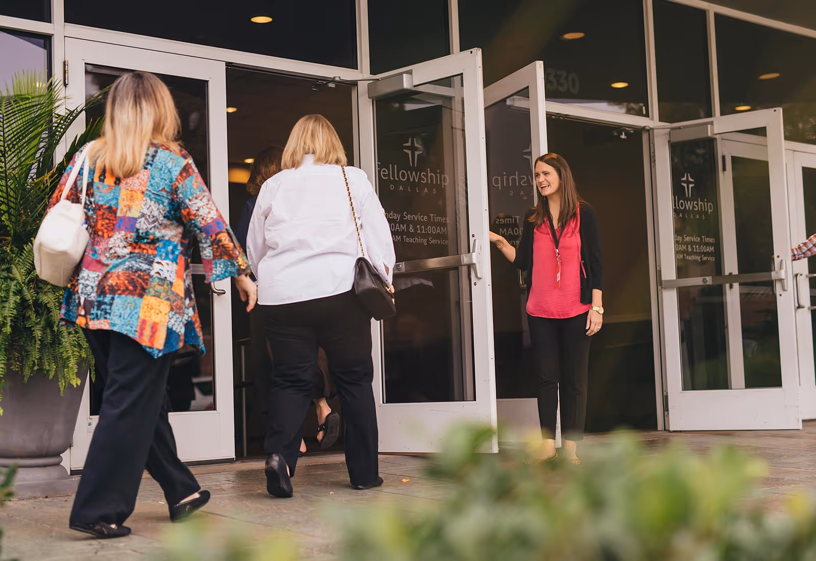 Fellowship Dallas serve ministry hero image of volunteers in action