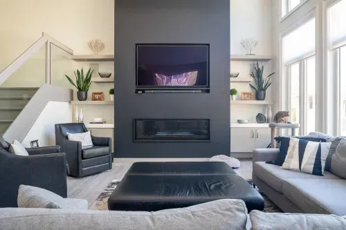 Great room with large accent wall and fireplace