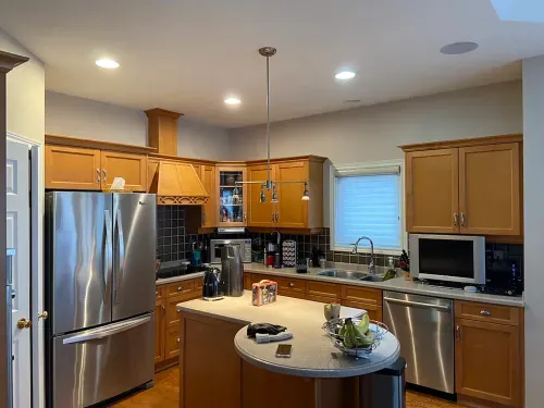 Before image of dated kitchen layout