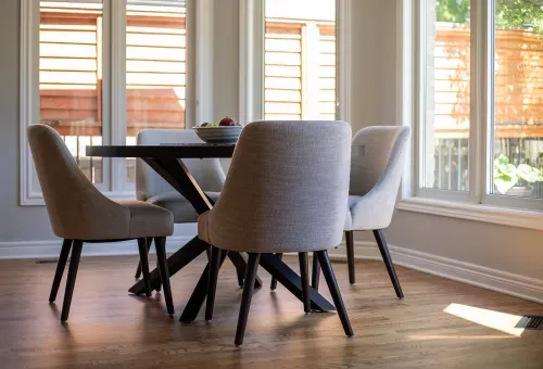 Dining room table with upholstered chairs