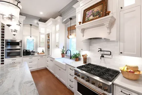 White kitchen cabinets and stovetop