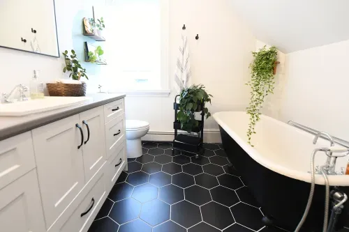 Bathroom with black hexagon tile floor