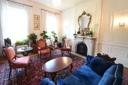 Living room seating area with velvet furniture
