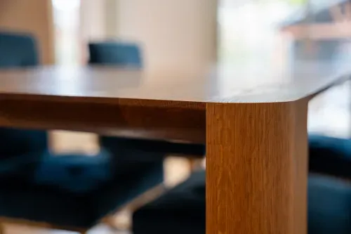 Close up of woodgrain texture and clean lines on custom table