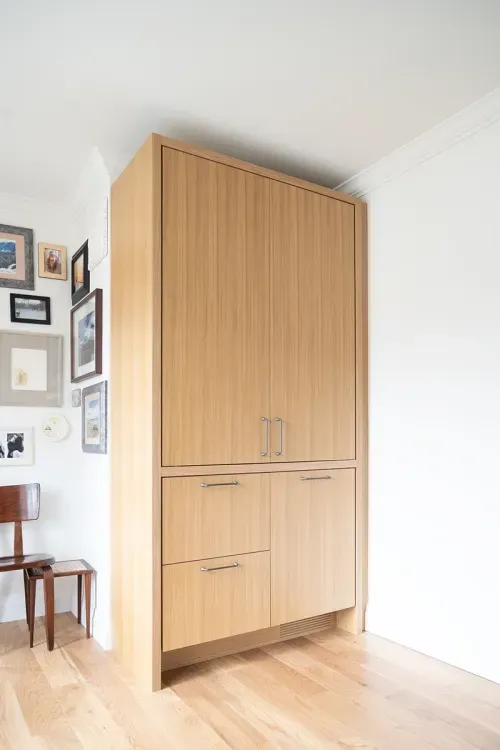Wooden cabinet against wall