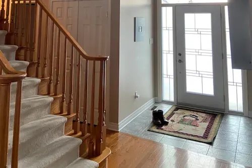 Before photo: wooden staircase side view