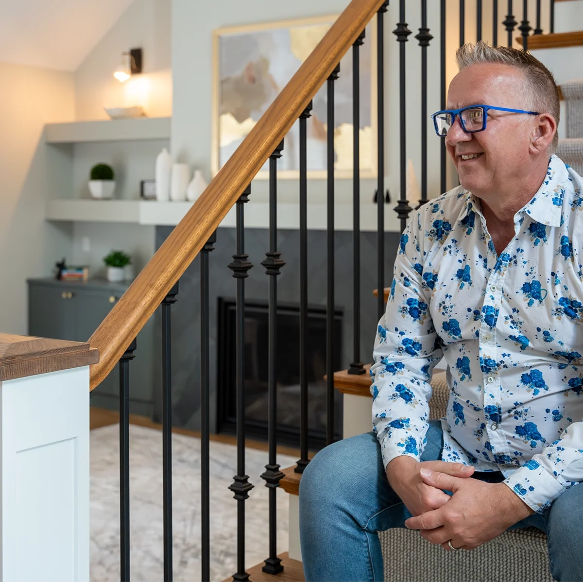 Homeowner sitting on stairs