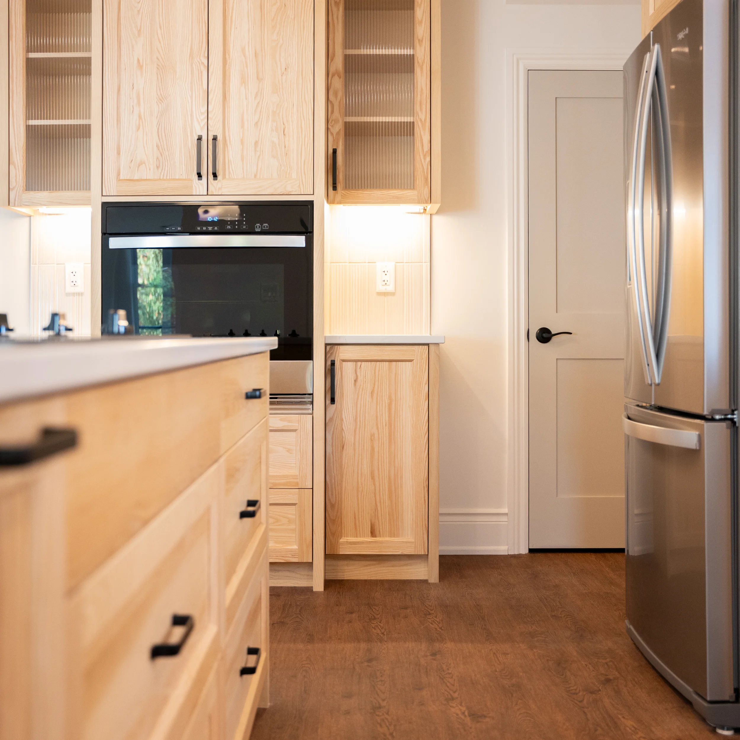 Accessible kitchen with cupboards, cabinets, appliances