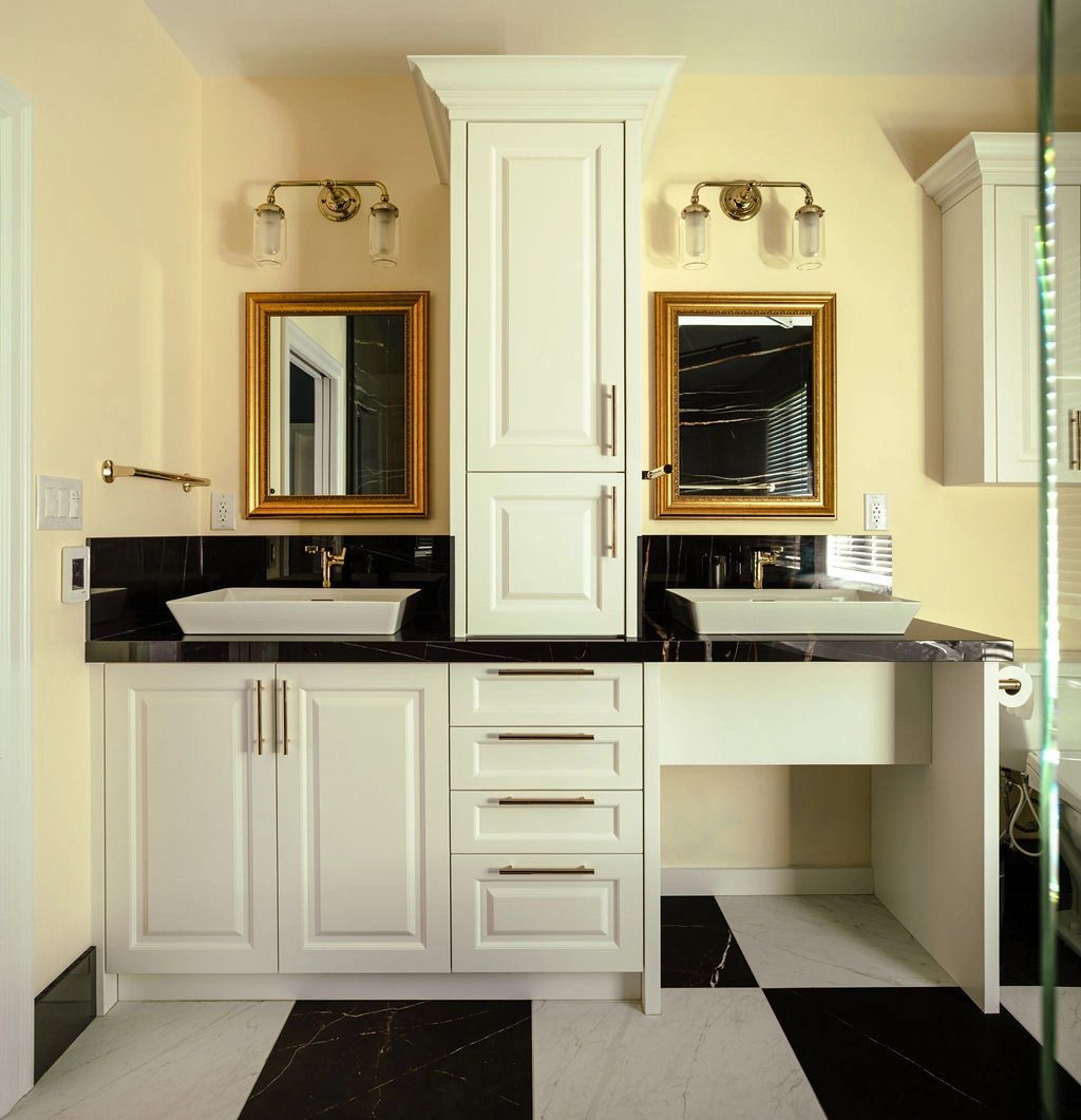 black and white vanity aarea with wheelchair space