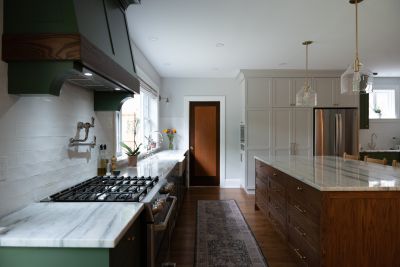 Solid wood cabinetry with bronze drawer pulls